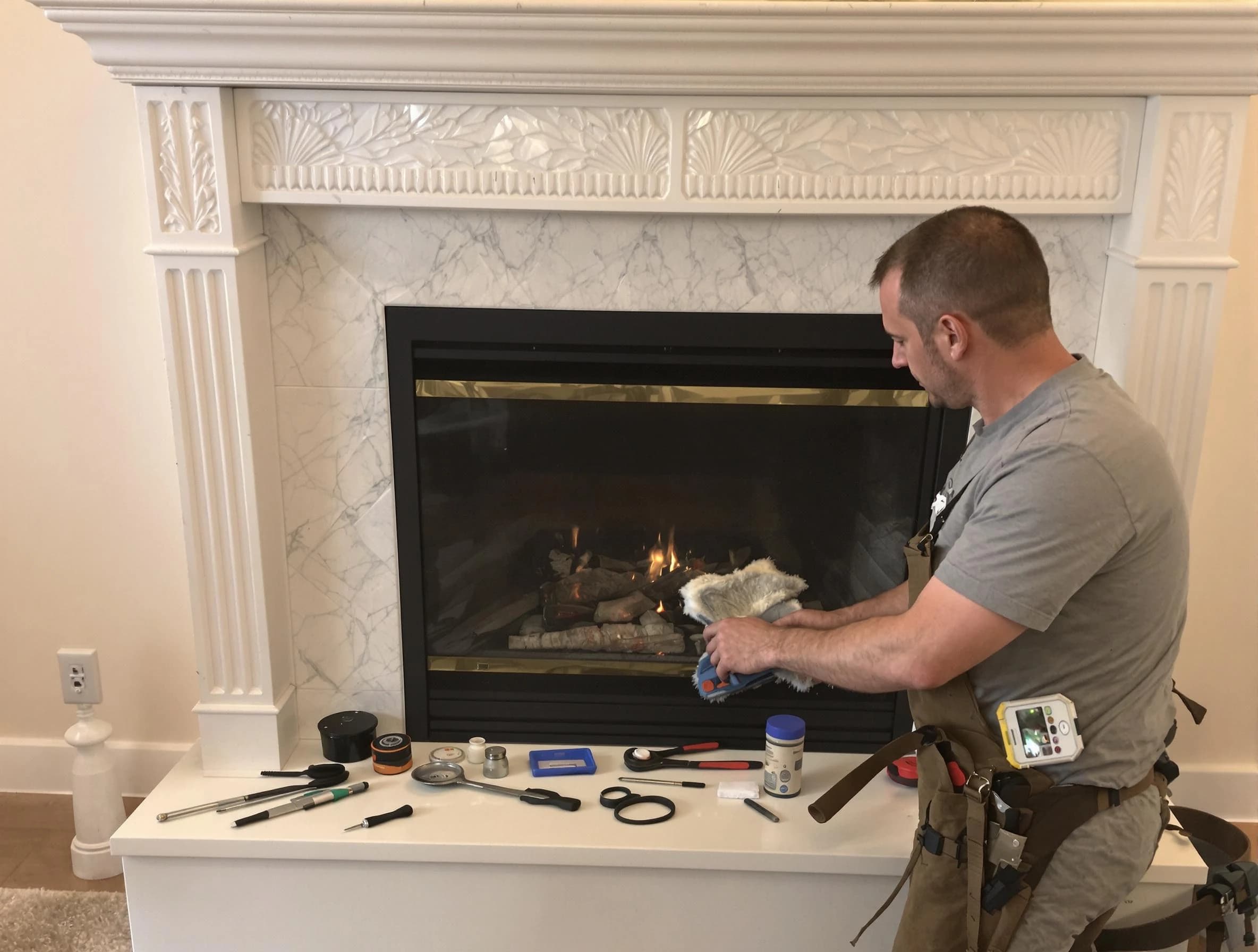 Norwood Chimney Sweep performing fireplace maintenance in Norwood, MA